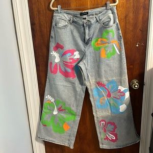 Ashley Stewart Size 18  women’s jeans Painted flower graphics on front and back